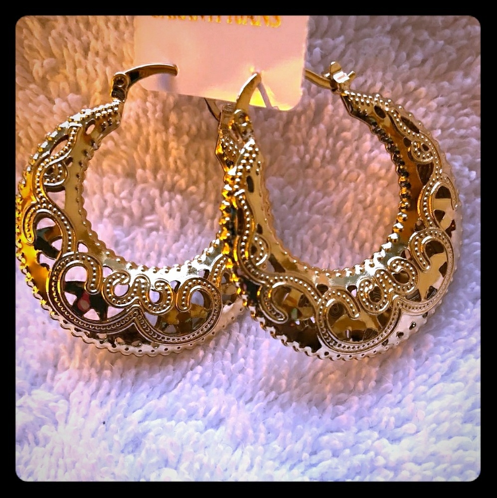 Woman gold earrings